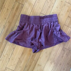 FP movement Women's Ruffled Stretch Waist Athletic Shorts — Purple